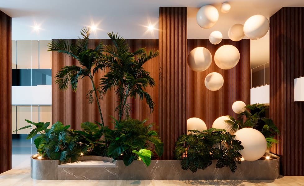 a room with plants and white balls