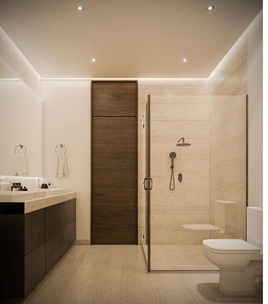a bathroom with a glass shower and sink