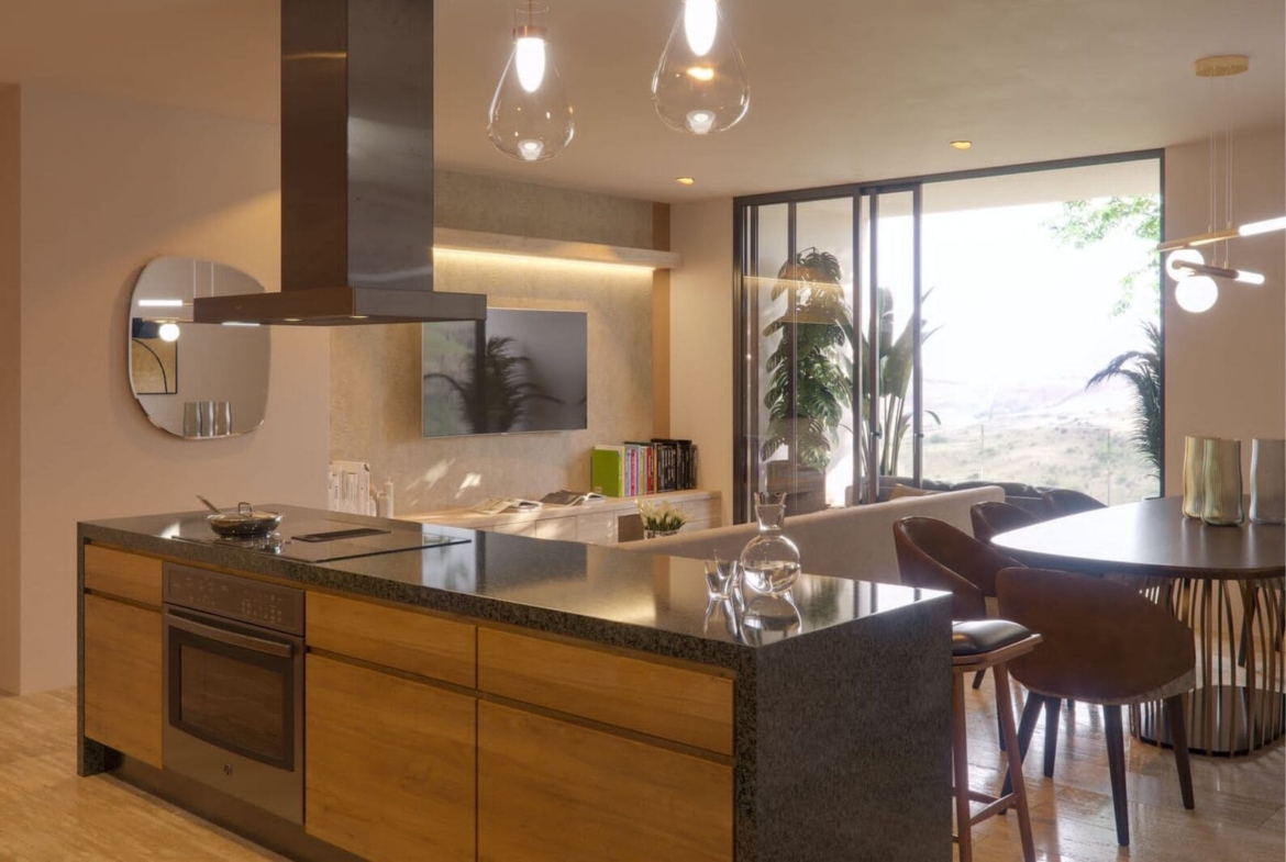 a kitchen with a table and chairs