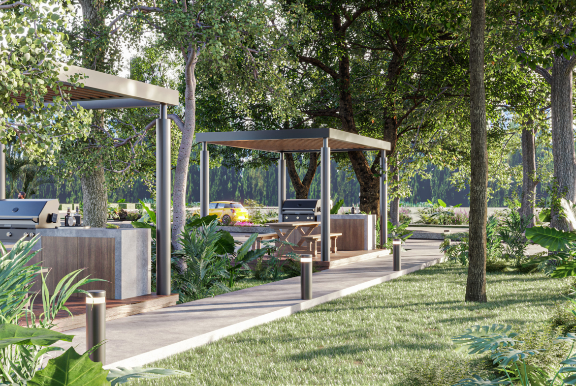 a picnic area with a grill and a table