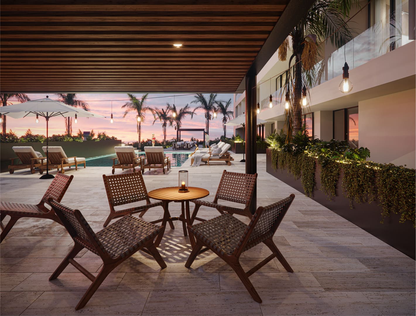 a patio with chairs and a table