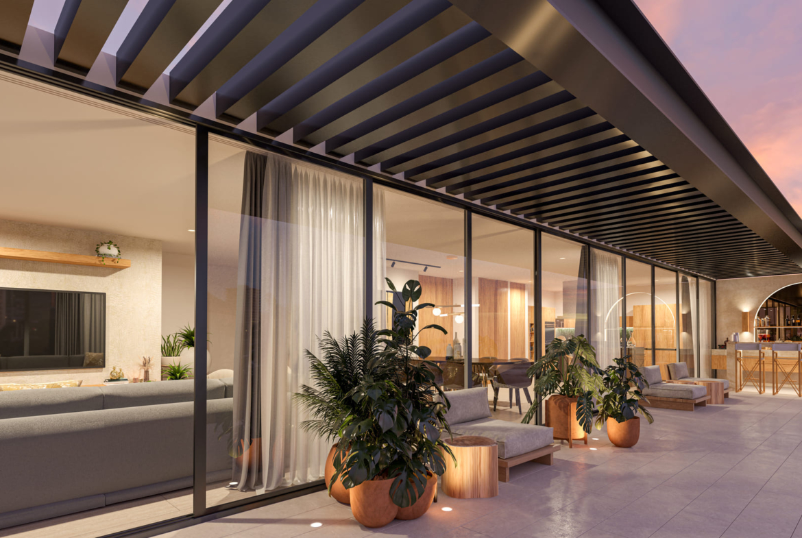 a building with glass walls and a patio with plants