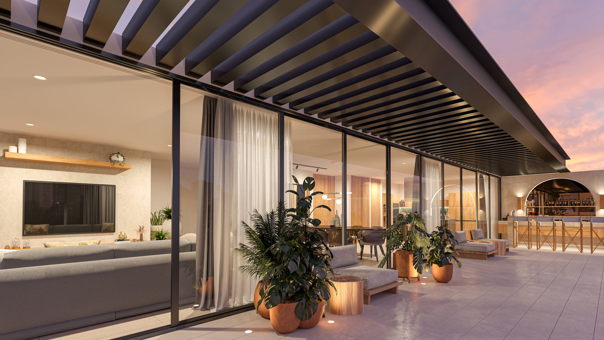 a building with glass walls and a patio with plants